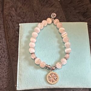 Elegant Pink Beaded Bracelet with Gold Charm